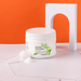 Container of 'Optimal Electrolyte' on a light surface with an orange background | Green Apple / 1 Pack, Green Apple / 3 Pack, Green Apple / 6 Pack