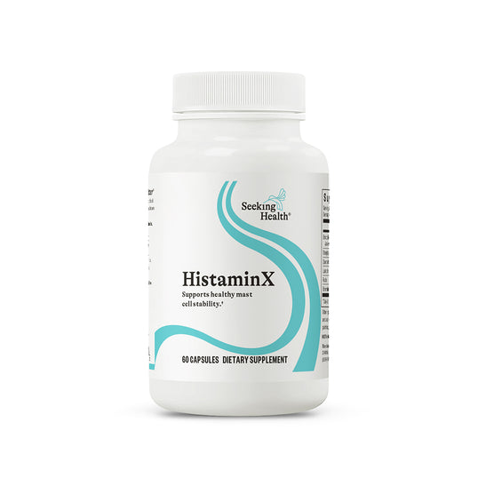 Supplement bottle labeled 'HistaminX' by Seeking Health on a white background