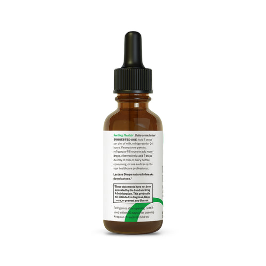 Brown glass dropper bottle with a label on a white background