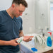 Image of man pouring product into hand  | AB-1 | AB-2