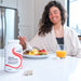 Image of woman eating at table 