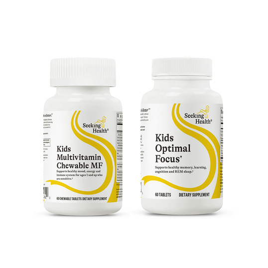 Two white bottles with labels, one labeled 'Kids Multivitamin Chewable MF' and the other 'Kids Optimal Focus'. Both labels feature the 'Seeking Health' logo and are designed with yellow accents.