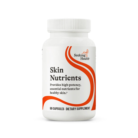 Supplement bottle labeled 'Skin Nutrients' by Seeking Health on a white background