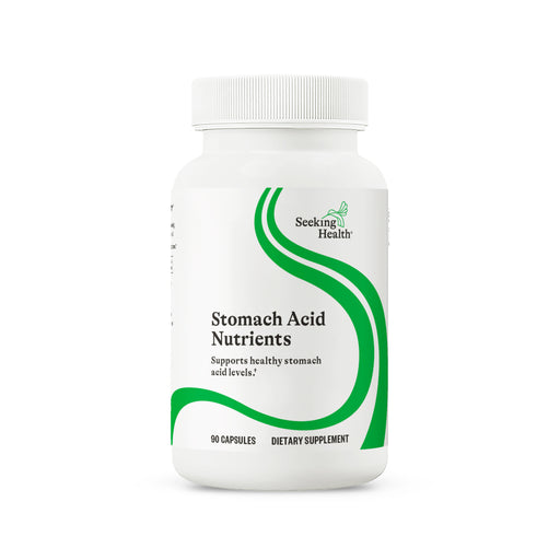 Supplement bottle labeled 'Stomach Acid Nutrients' by Seeking Health on a white background