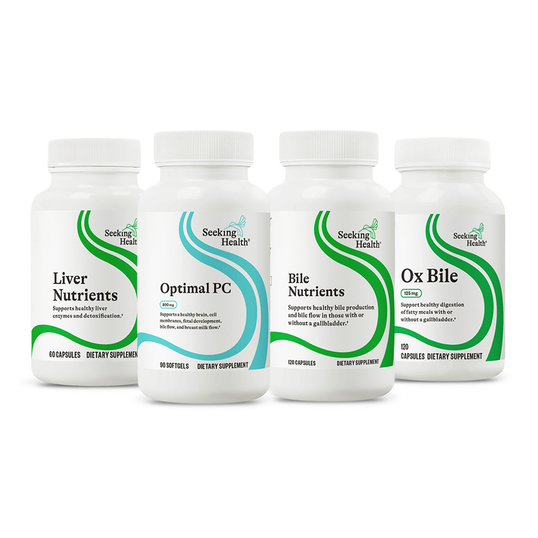 Four bottles of Seeking Health supplements on a white background