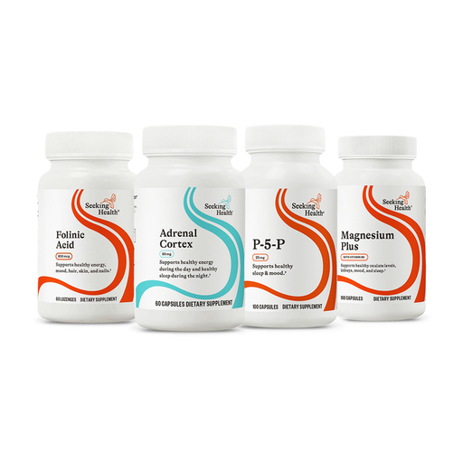 Four supplement bottles from Seeking Health on a white background
