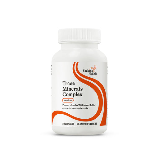 Supplement bottle labeled 'Trace Minerals Complex' by Seeking Health on a white background