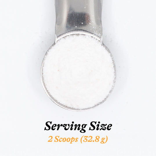 Metal scoop with powder and text indicating serving size on a white background
