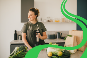 Image of woman mixing a smoothie